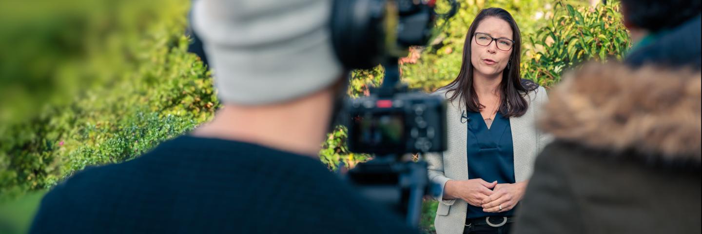 Reporter talking to the camera